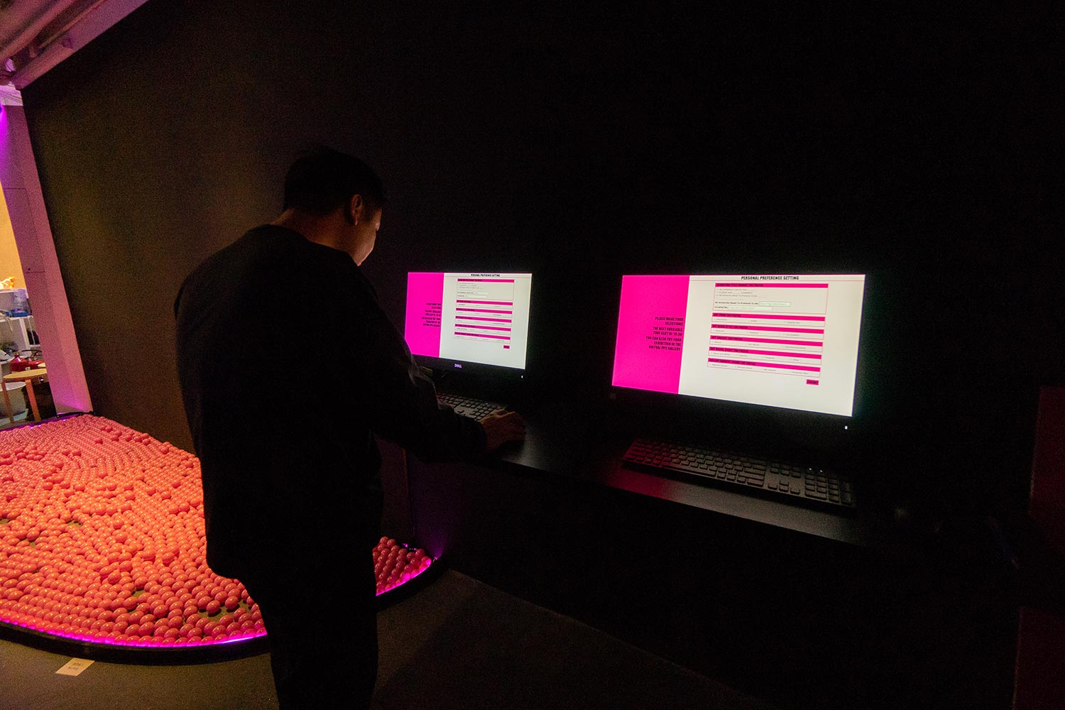 K11 visitor creating a custom exhibition using on-screen forms